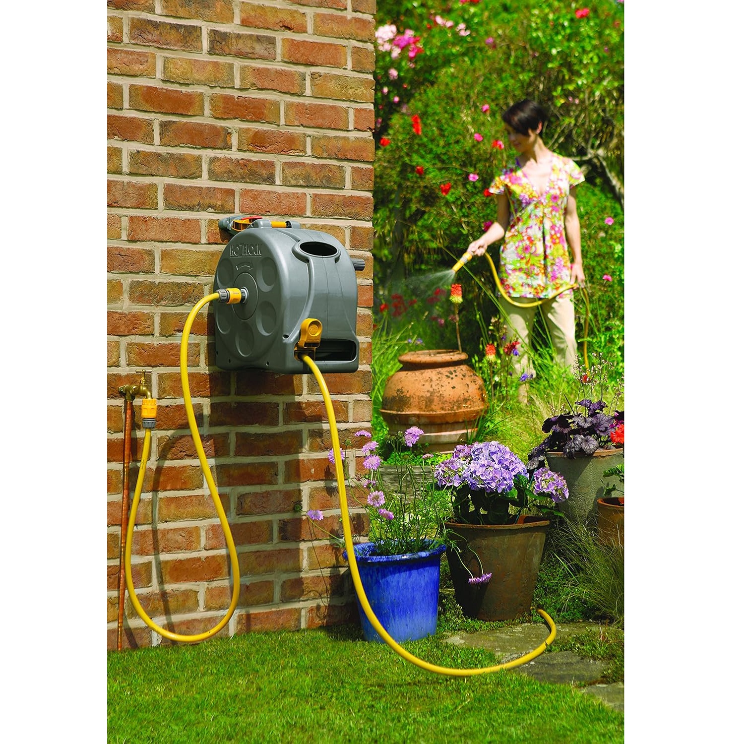 Hozelock 2-in-1 Compact Enclosed Hose Reel Grey Yellow 2415 | With 25Mtr Hose Pipe | Wall Mounted or Free Standing | Ready to Use Manual Rewind Layering System | Garden Patio Lawn Car Wash Watering | Supplied with Complete Fittings Hozelock 2-in-1 Compact Enclosed Hose Reel Grey Yellow 2415 | With 25Mtr Hose Pipe | Wall Mounted or Free Standing | Ready to Use Manual Rewind Layering System | Garden Patio Lawn Car Wash Watering | Supplied with Complete Fittings